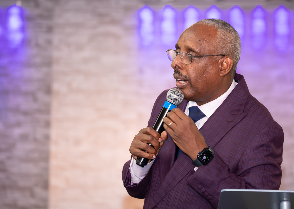 Rev. Peter Mutima preaching