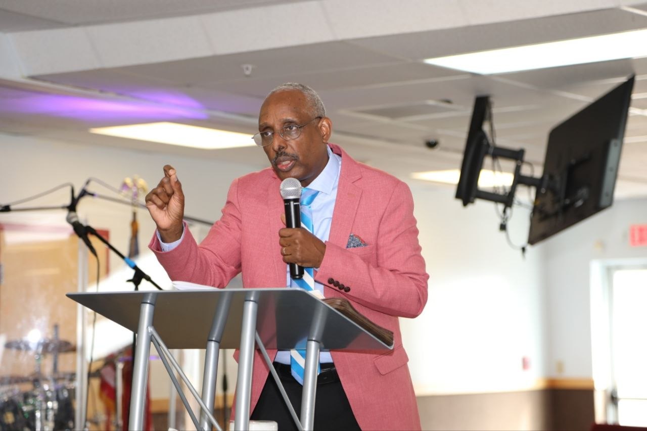 Rev. Peter Mutima preaching at Bethel Christian Center